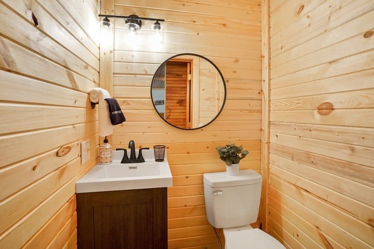 This 1/2 bath is conveniently located off the family room between the master and guest bedroom.