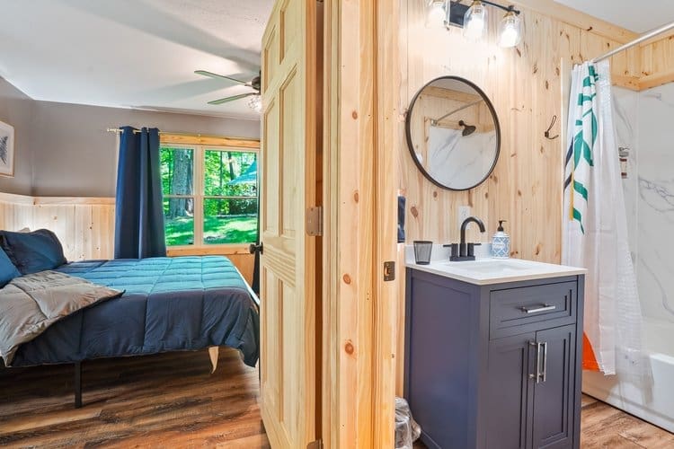 This full bathroom is located off the kitchen.