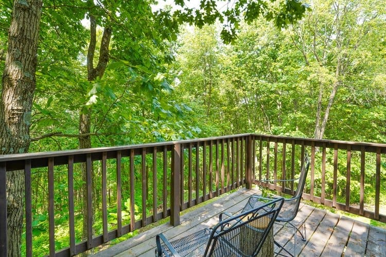 Be captivated on your private deck among the trees with a beautiful view of the horizon.