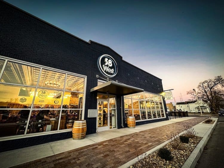 Exterior view of 58 West restaurant and bar with patio seating