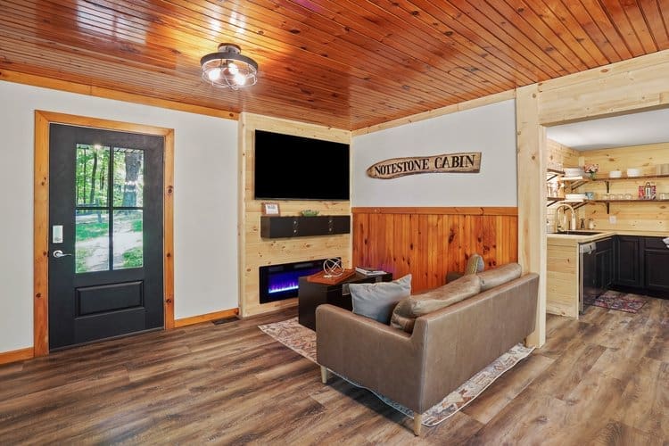 Relax in front of the electric fireplace, enjoy your favorite games, or binge watch your favorite show on the 65-inch wall-mounted TV.