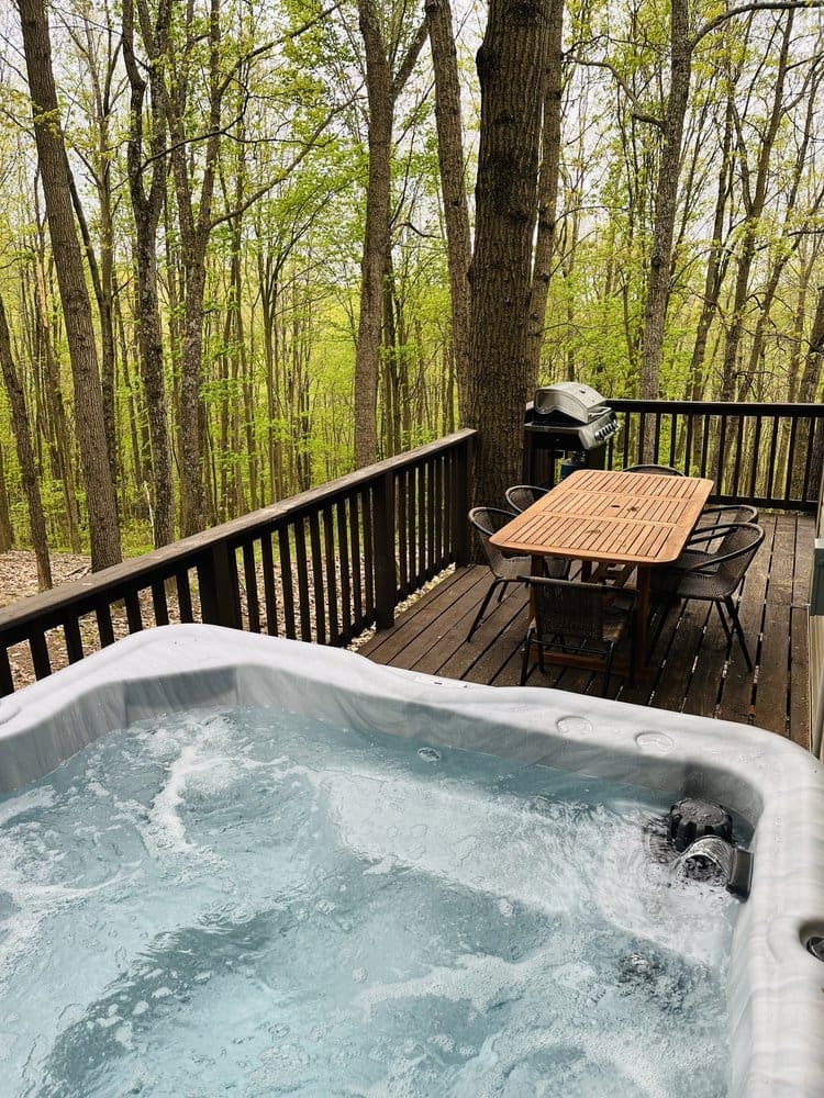 Fire up the bubbles in your private 6 person hot tub.
