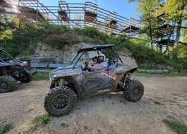 Off-road UTVs lined up at Nevillebillie Adventure Park
