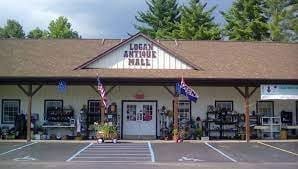 Entrance view of Logan Antique Mall with floral decorations